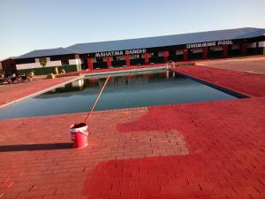 a bucket of water in front of a building at Kimberly in Goodwood