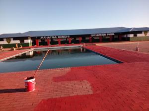 a pool of water in front of a building at Kimberly in Goodwood