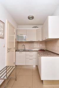 Kuchyň nebo kuchyňský kout v ubytování Hotel Aruba + 52 fotografií