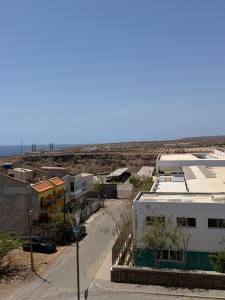 an aerial view of a city with buildings at Ocean Palm Apartments II - Edifício Paradis- Cidadela in Praia