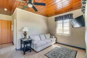 a living room with a couch and a ceiling fan at Lake View, Pool Access! Pet-Friendly Hernando Stay in Hernando