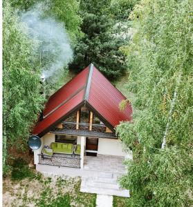 an overhead view of a house with a red roof at Mountain rest Brezna in Plužine