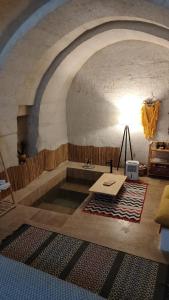 a room with a pool of water in a building at Route Cappadocia in Avanos