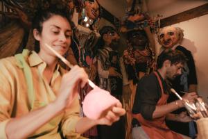 a woman brushing her teeth in front of a group of people at Casa de Sierra Nevada, A Belmond Hotel, San Miguel de Allende in San Miguel de Allende +88 photos