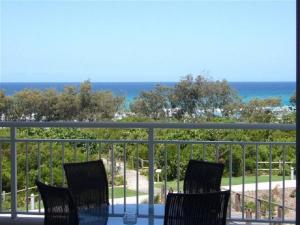two chairs sitting on a balcony overlooking the ocean at Salt Beach Resort Suites by Kingscliff Accommodation in Kingscliff +11 photos