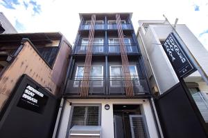 a building with the front entrance of a building at Advanced Stay Hakata in Fukuoka