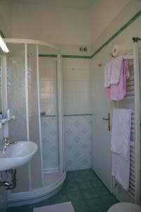 Ванная комната в Hotel Villa Rosa