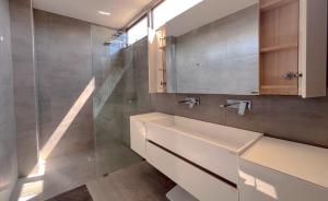a bathroom with a sink and a shower at Maerim Luxury 3BR Pool Villa with Mountain View in Ban Tai +59 photos