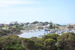 a group of boats docked at a marina at Harbour View Motel in Robe