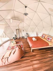 a room with two beds in a yurt at Mondara Villa and Glamping in Ban Bo Wi +91 photos