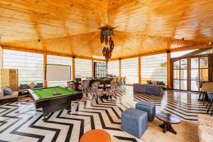 a large room with a pool table in it at Brij Bageecha, Jaipur - IHCL SeleQtions in Jaipur