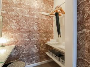 a bathroom with a wall covered in wallpaper at South Segganwell - Culzean Castle in Maybole +53 photos