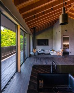a kitchen and living room of a house at MONS GORA Luxury Private Villa with Onsen Hakone Gora in Hakone +42 photos