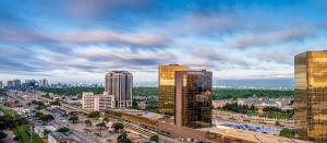 a view of a city with tall buildings at DoubleTree by Hilton Hotel Dallas Campbell Centre in Dallas
