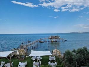 a dock in the middle of the water at L'antica Terrazzella in Vasto