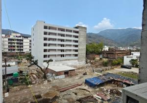 a building under construction in a city at VedaVibe Tapovan in Rishīkesh