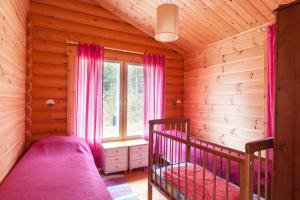 Postel nebo postele na pokoji v ubytování Toriko Village