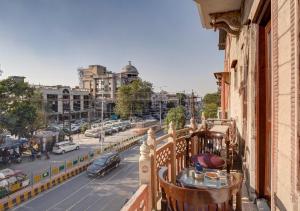 a balcony with a view of a city street at Hotel Royal Prithvi Palace Near Ghaziabad Railway Station in Ghaziabad