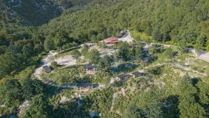 an aerial view of a house on a mountain at L'Acciola in Evisa +1 photo