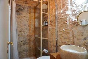 a bathroom with a shower and a sink at Red Palazzo Fossanova in Priverno +117 photos