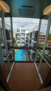 a view of a balcony of a building with a swimming pool at Boracay Haven Suites in Boracay