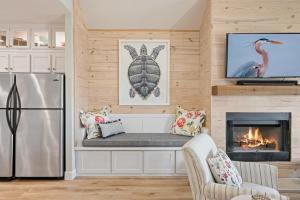 a living room with a couch and a fireplace at Gulf State home in Crystal Beach