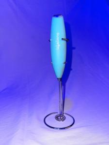 a blue wine glass sitting on top of a table at Cozy Inn Hostel in New Delhi