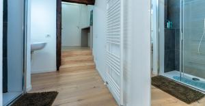 a bathroom with a shower and a toilet and a sink at Stay Bergamo Centro in Bergamo +74 photos