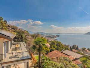 a view of the water from a house at Villa Suna Paradiso in Verbania