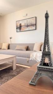 a eiffel tower in the middle of a living room at Modern Flat in Khouribga in Khouribga
