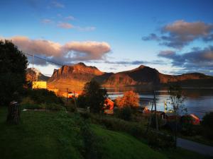 a view of a lake with mountains in the background at Senja Sjøtun House in Senja