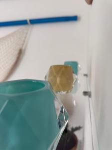 a close up of a glass bowl on a wall at Andrew'S home - Playita in Torre Pali +49 photos
