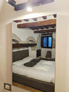 a bedroom with a bed in a room at Casa Vacanze Todi in Todi