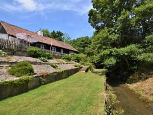 a view of the house from the garden at 2 Bed in Sherborne oc-53673 in Chetnole