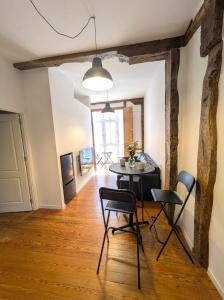 a dining room with a table and chairs at Basque Suite in Bilbao +68 photos