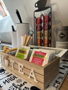 a wooden crate filled with books on a table at Stayhome in Ruse