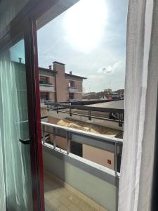 an open window with a view of a building at Master Hotel in Cadelbosco di Sopra