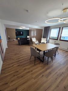 a meeting room with a table and chairs in an office at Jugendgästehaus Lichterfelde JuLi in Berlin