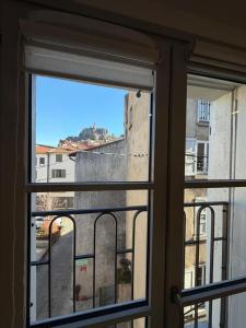 a view from a window of a building at Les suites Villeneuve - 3 in Le Puy-en-Velay