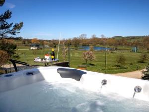 a bath tub with a view of a park at 1 Bed in Richmond oc-82829 in Gilling