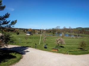 a park with trees and a lake in the background at 1 Bed in Richmond oc-82829 in Gilling