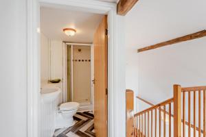 a bathroom with a toilet and a staircase at 2 Bed in Askrigg oc-b27667 in Marsett +21 photos