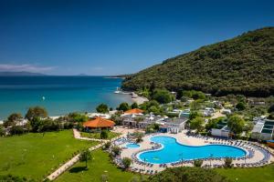 an aerial view of a resort with a pool at MASLINICA Oliva Camping Pitches in Rabac
