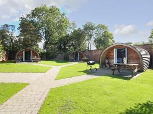 a group of domes in a field with grass at 1 Bed in Rocester oc-e33057 in Rocester