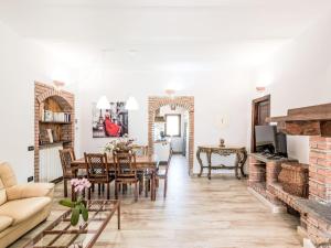 a living room with a couch and a table at Apartment Casa Domenico 2 by Interhome in Montefiascone