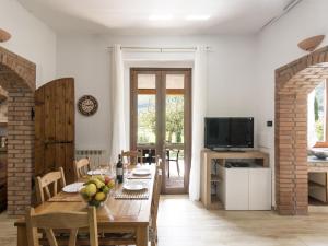 a kitchen and dining room with a table and chairs at Apartment Casa Domenico n- 1 by Interhome in Montefiascone