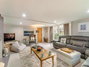 a living room with a couch and a table at 2 Bed in Consett oc-90576 in Whittonstall
