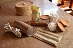 a counter top with a mortar and pestle and some ingredients at 南国リゾート Bari Okinawa 連泊宿泊限定価格 in Itoman +50 photos