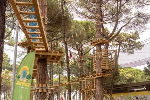 a wooden tree house in a park at Glamping Lido di Spina in Lido di Spina +32 photos