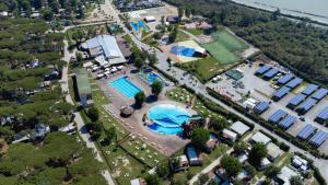 an aerial view of a swimming pool at a resort at Glamping Lido di Spina in Lido di Spina